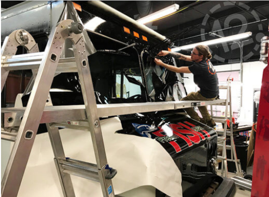 Food truck wrap installation for Fresh Fish & Fry. 12-Point SignWorks - Franklin, TN