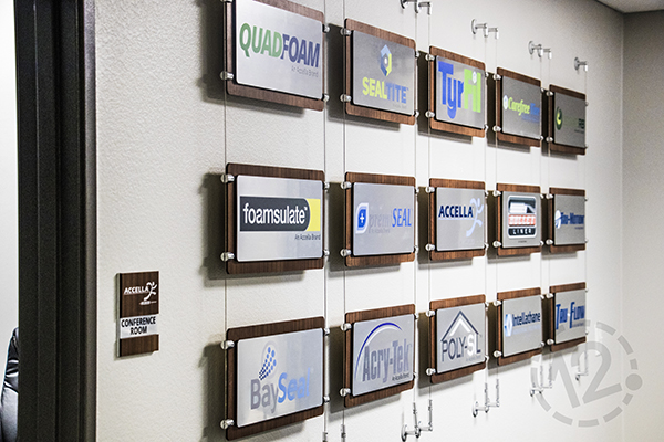Tensioned Cable Display for Accella Performance Materials. 12-Point SignWorks - Franklin, TN