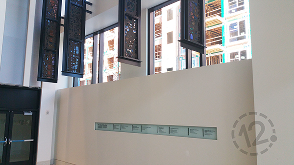 This photo shows the stained glass panels with the clear glass display underneath. 12-Point SignWorks - Franklin, TN