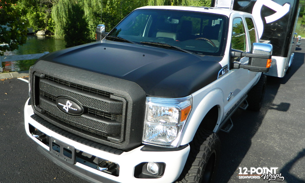 Close-up of the hood and custom emblem for SIF on the Ford F-350. 12-Point SignWorks