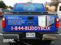 For the back window, we digitally printed the Buddy Box logo and website address on perforated window vinyl. The tiny holes cover 50% of the vinyl and allow for visibility from the inside out.