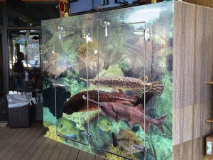 Vinyl wrap on Sams at the Cove restaurant cooler by 12-Point SignWorks