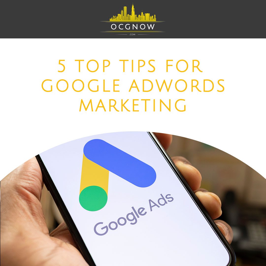 Entrepreneur holding a mobile phone to use Google Adwords Marketing