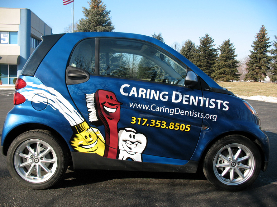 Kansas City, MO - Dentist Offices Gain Momentum in Community with Vehicle Wrap Installation