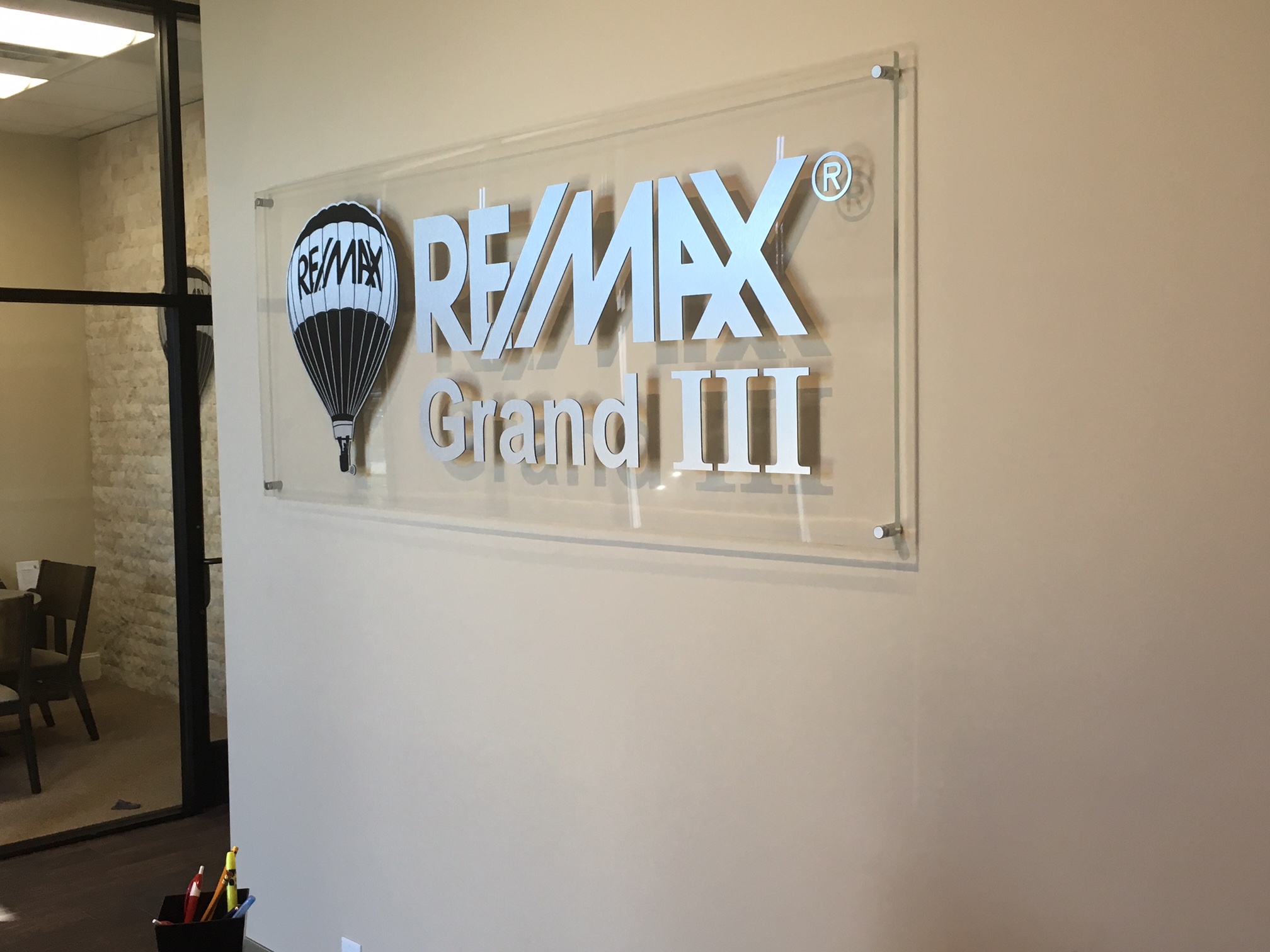 Katy, TX – Custom Lobby Signs and Conference Room Signs for RE/MAX