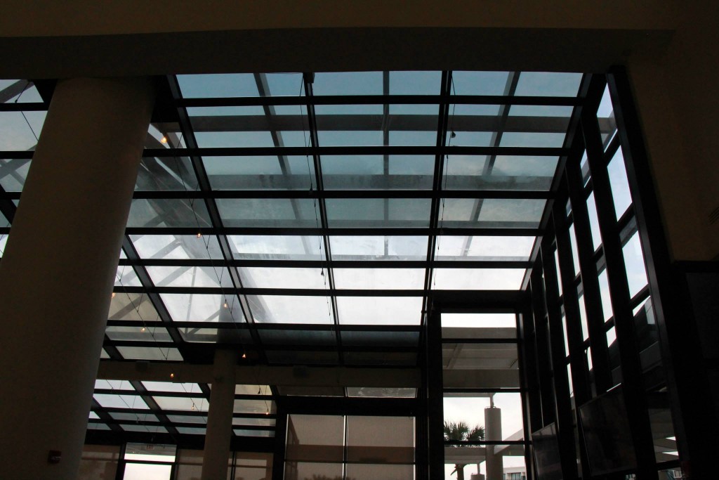 glass panels with old brown tint and partially filmed with new tint