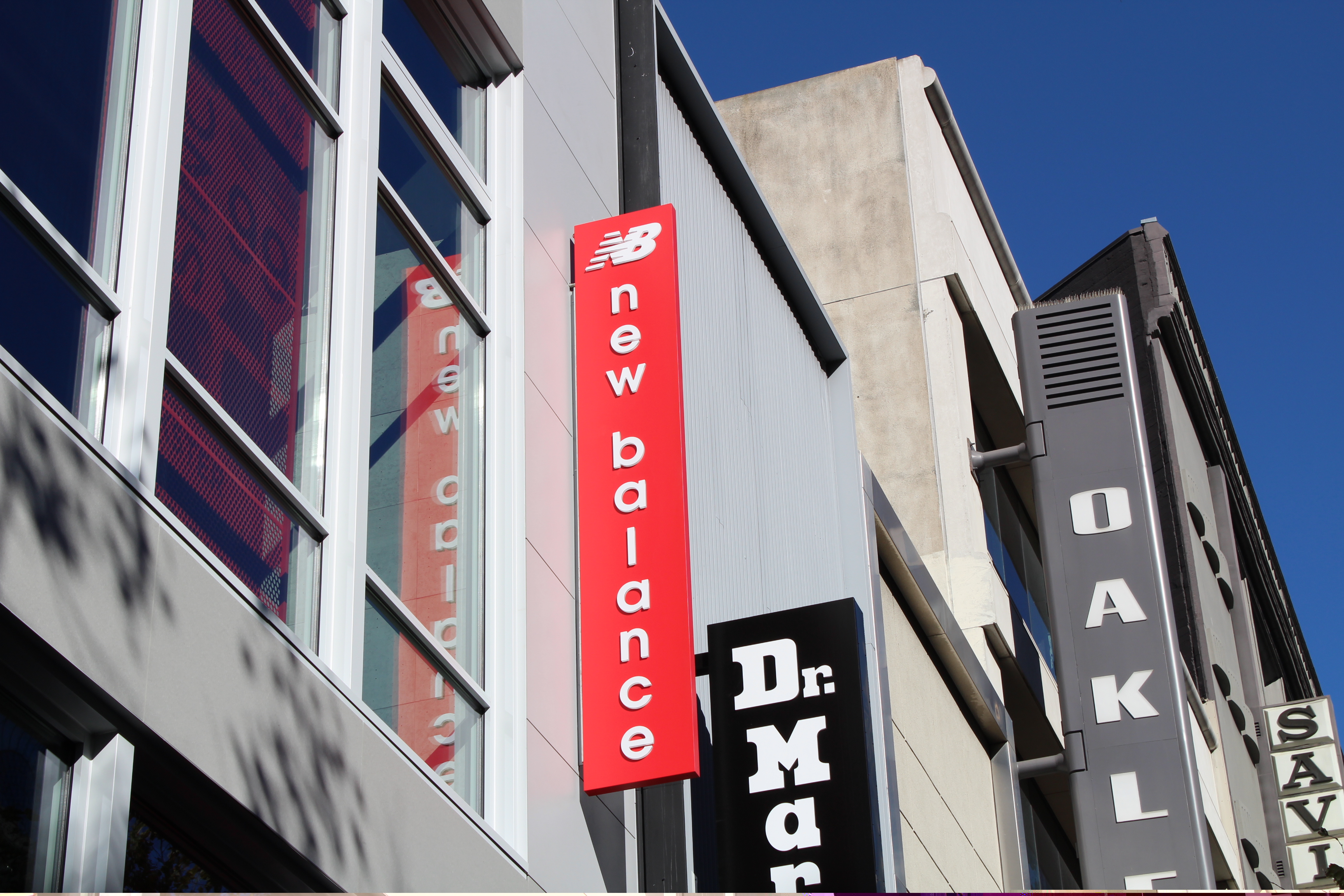 Madison, AL - We Make Custom Vertical Signs for Museums, Storefront Businesses