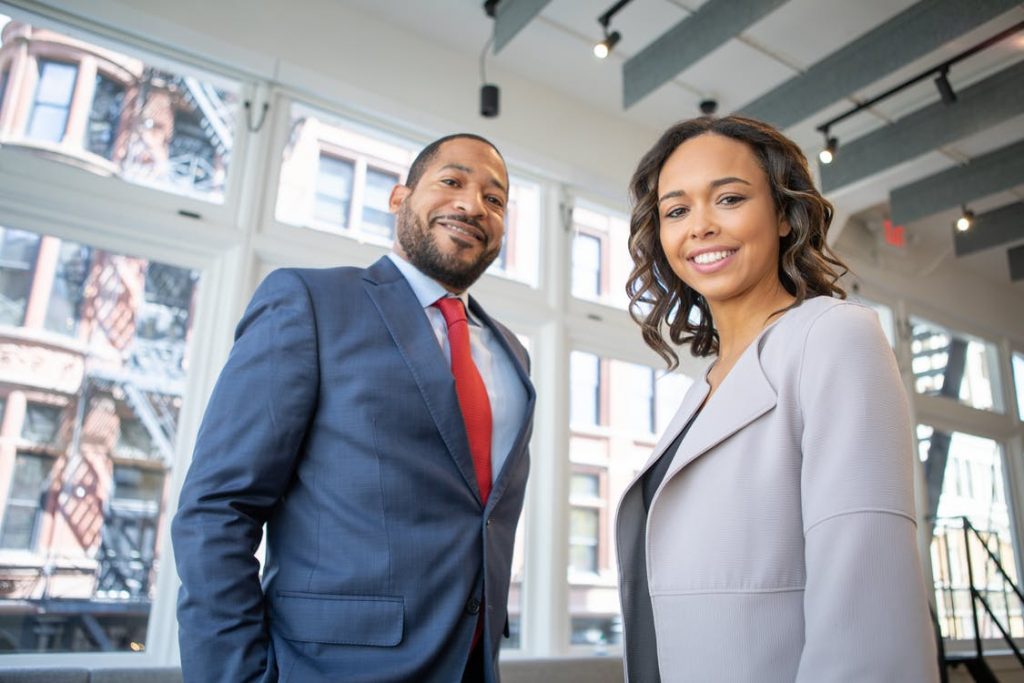 man and woman smiling