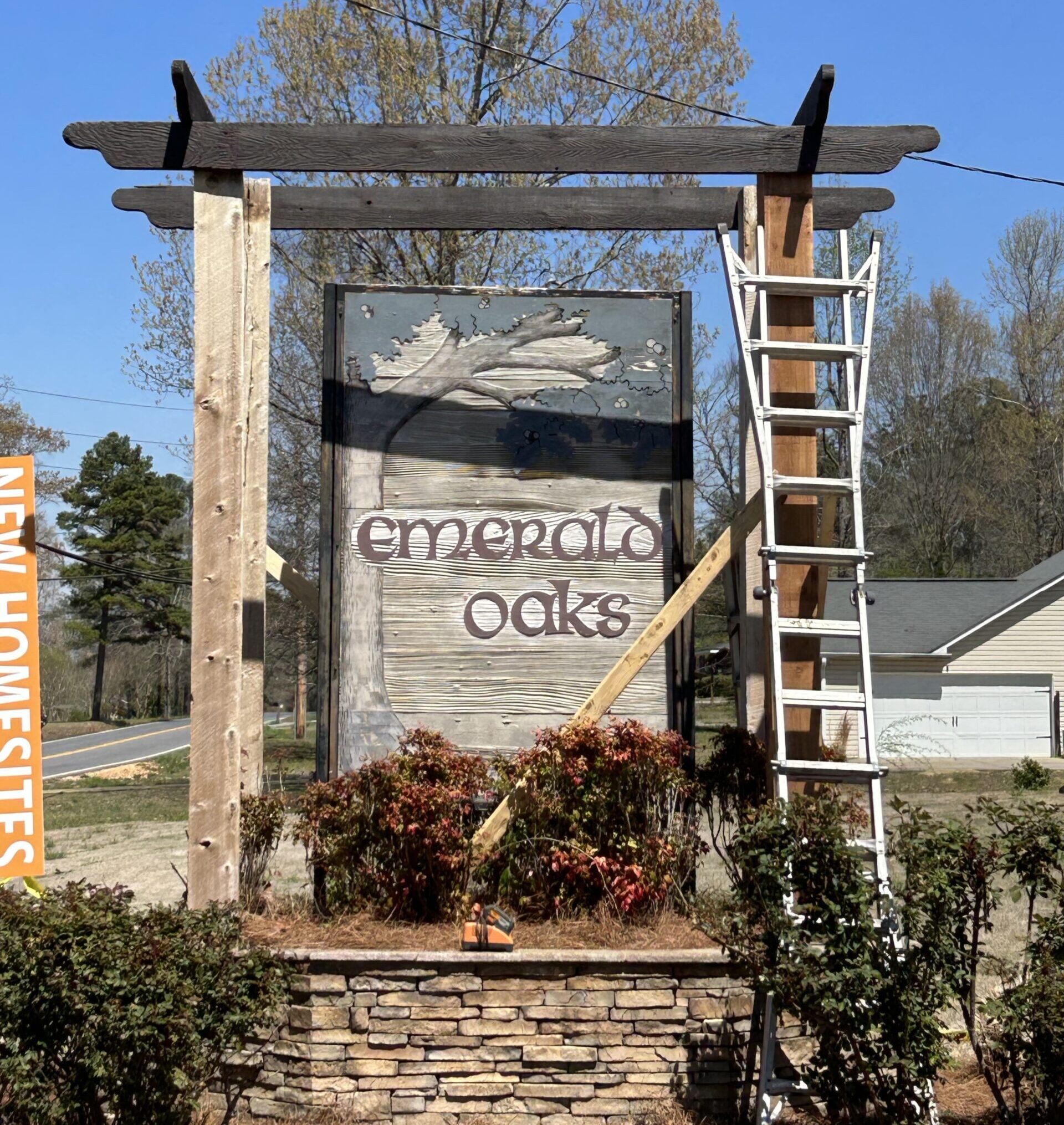 Monument sign refurbishment in progress for Emerald Oaks community entrance sign in Marietta GA