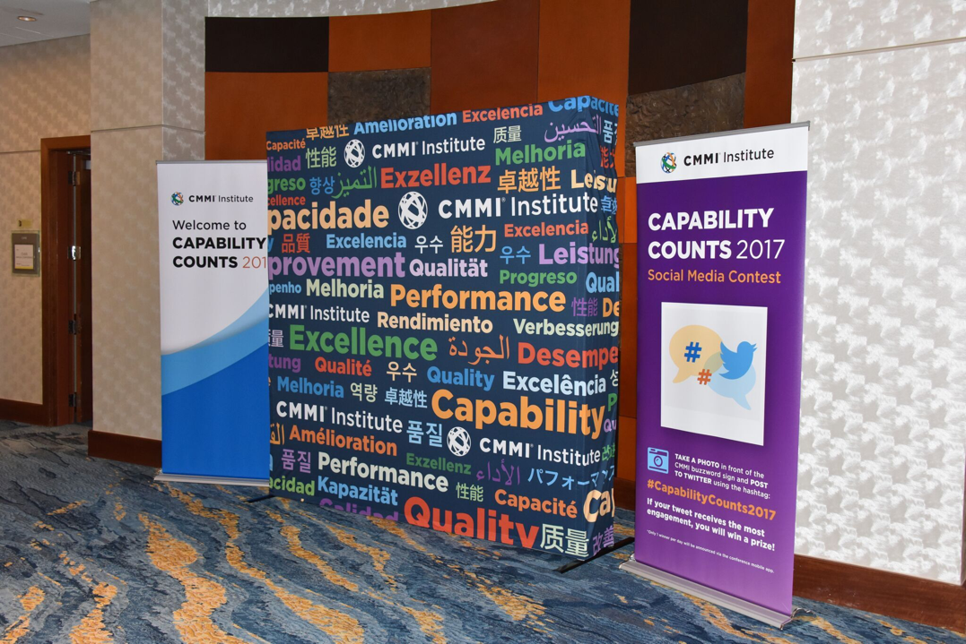 Spark Signs &amp; Graphics designs conference signs for The CMMI Institute – Washington D.C.