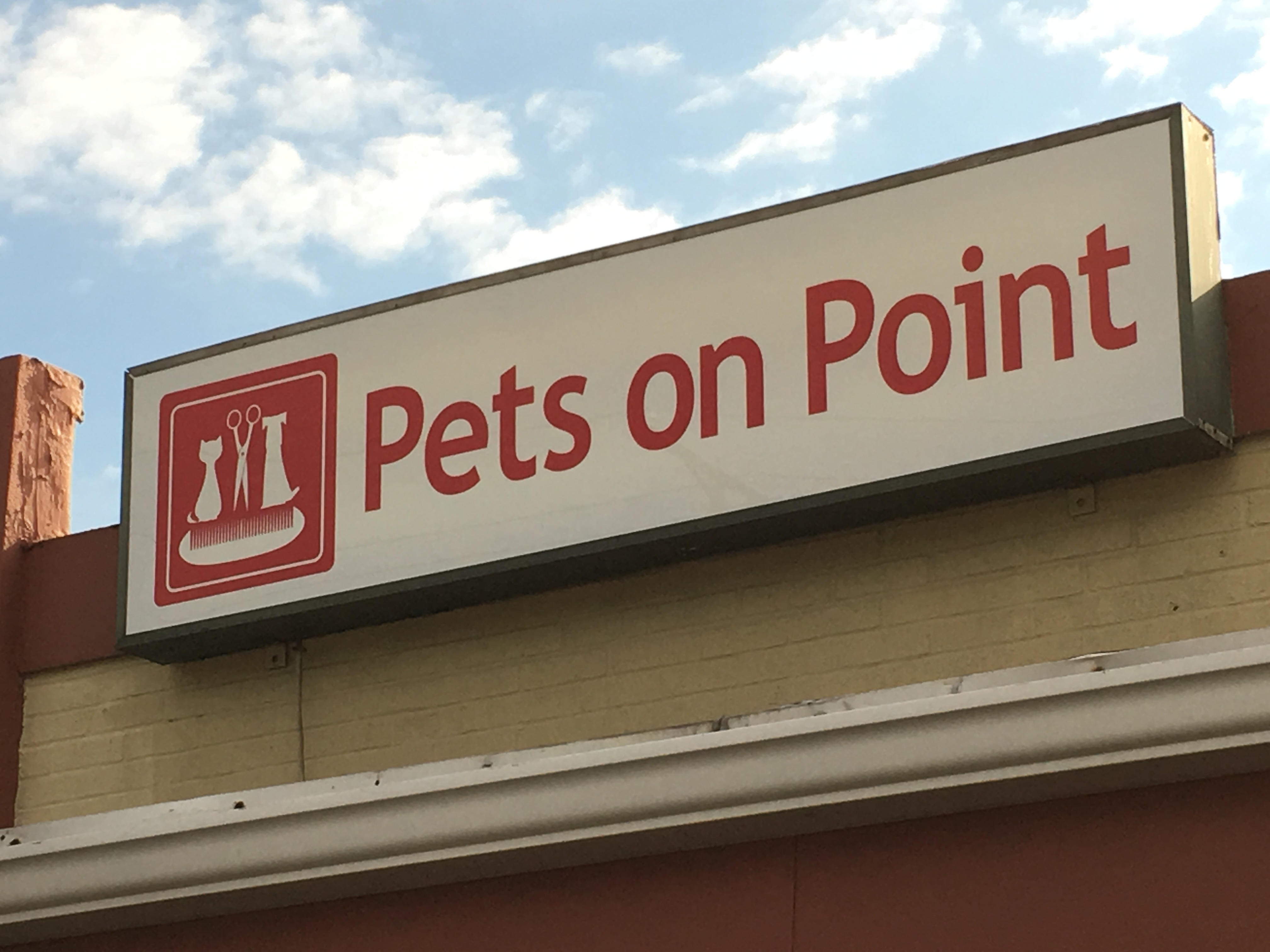 New Pet Grooming Center in Pittsburgh, PA Outfitted with New Lighted Cabinet Sign and Window Graphics from Spark Signs &amp; Graphics