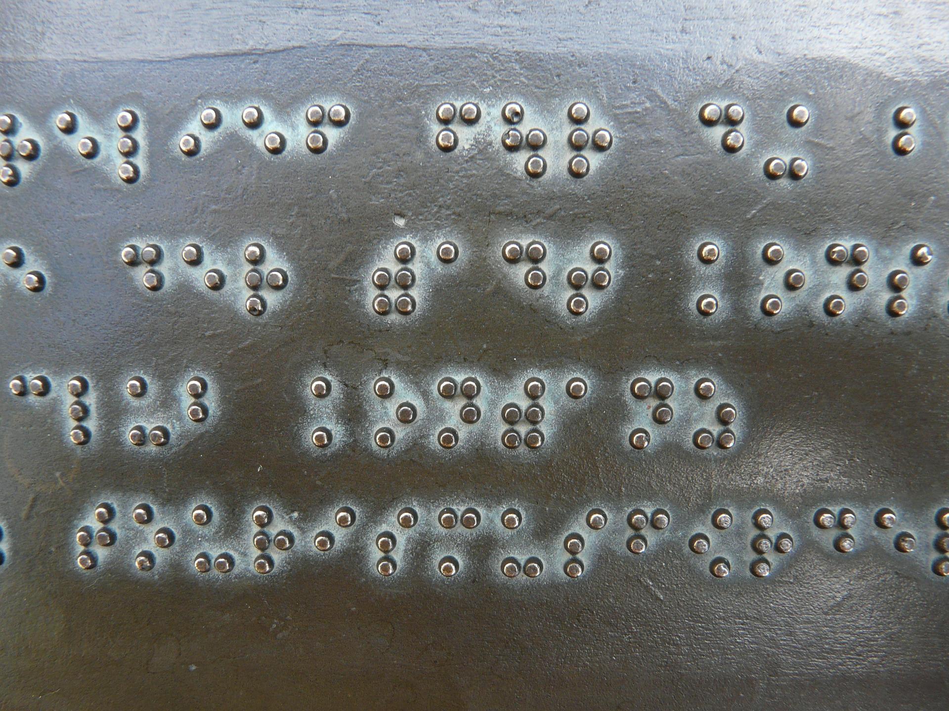 Tactile ADA Signs