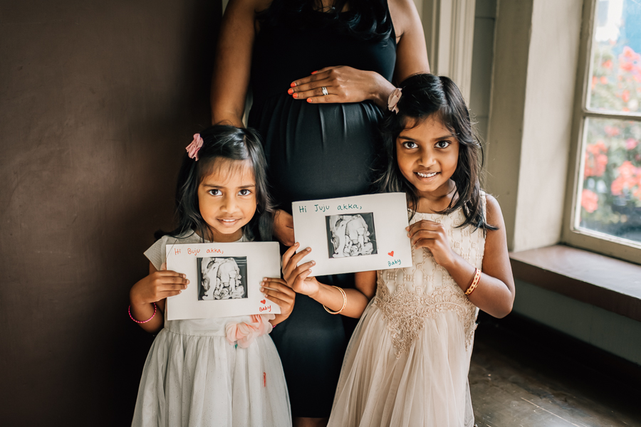 In-home maternity session with siblings
