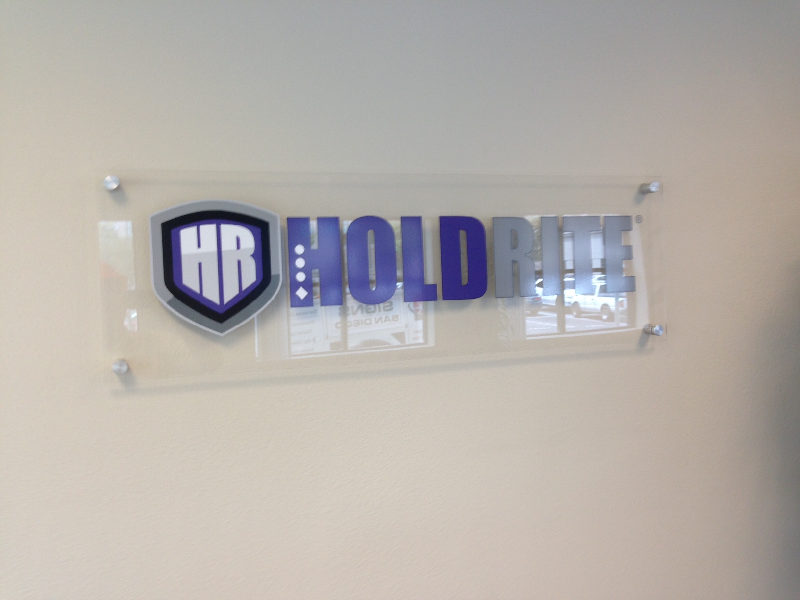 custom Lobby Sign Poway CA. This is a simple sign, with aluminum standoffs, acrylic panel and vinyl letters