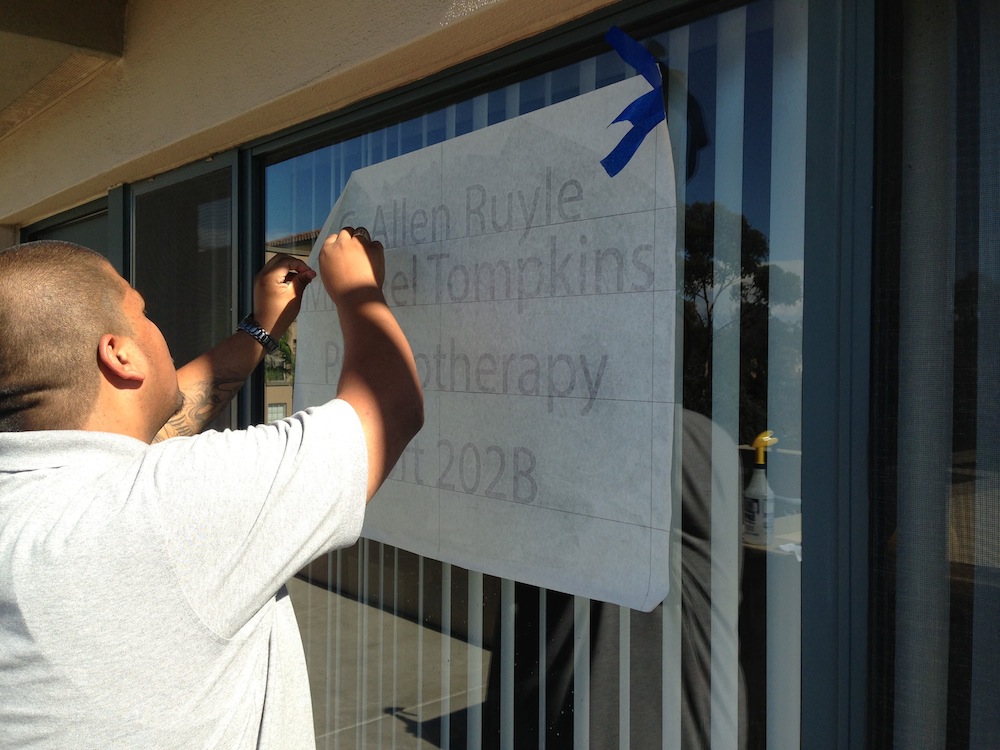 Cut vinyl letters on glass