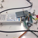 Power supplied for neon are called transformers and run 5000 to 15000 volts