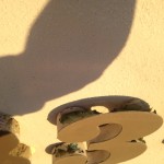 Foam letters attached by birds and sun