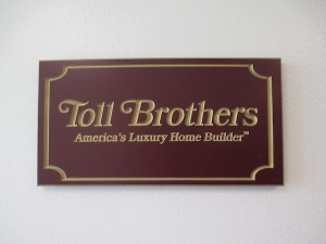 UHD Wood Lobby Sign