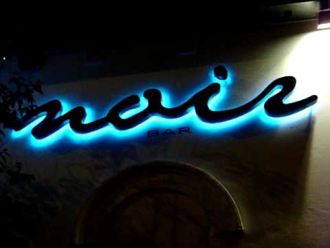 Using illuminated signs to attract customers day or night