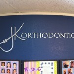 J K Orthodontics wall sign