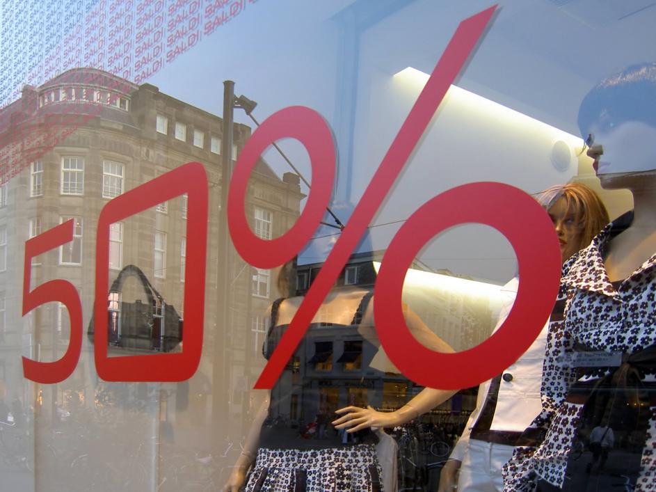 Window with sale sign on it 