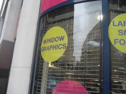 SMYRNA, GA –Custom Graphics for Exterior Windows Get Your Logo Remembered