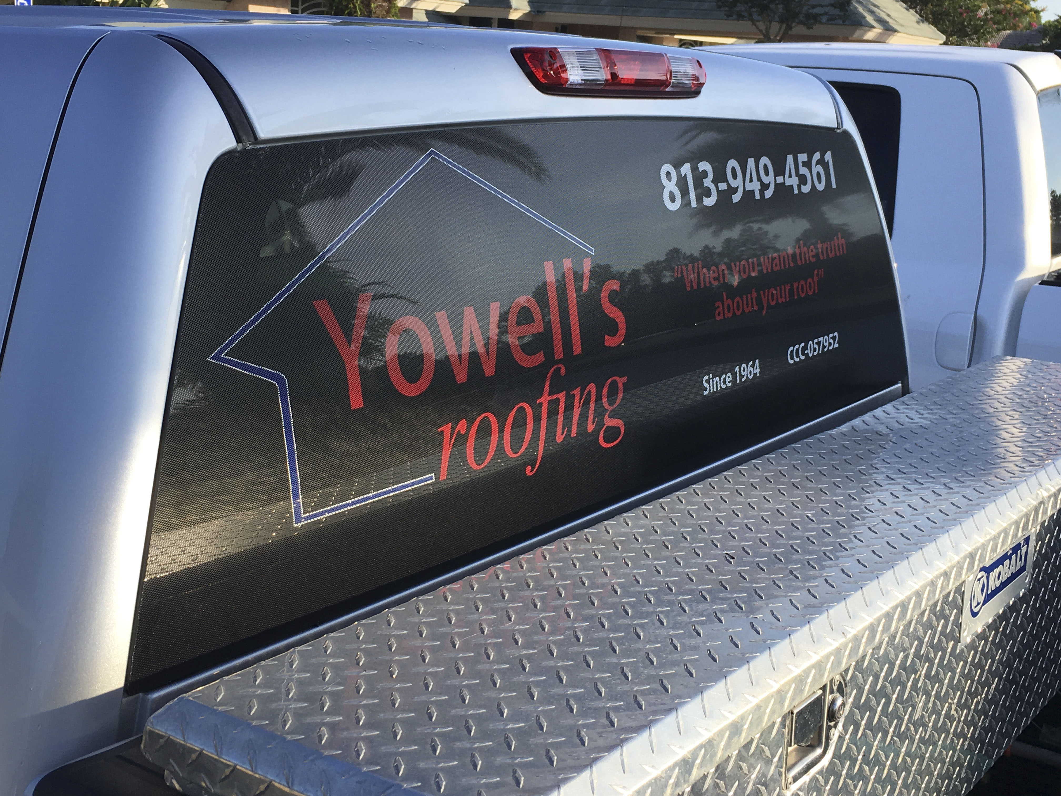 Tampa, FL – Check Out These Rear Window Vehicle Graphics for Yowell's Roofing Company