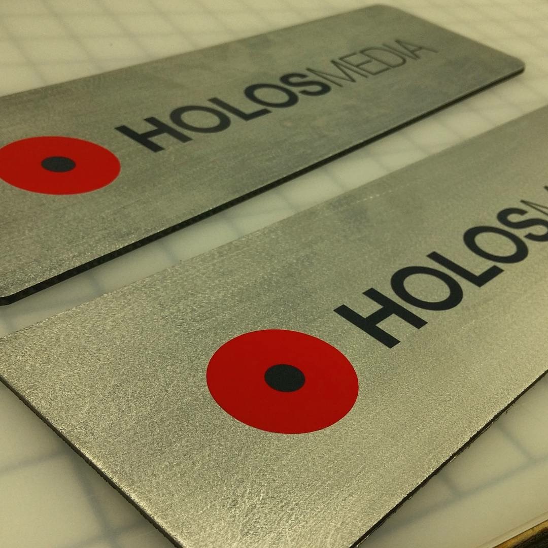 TAMPA, FL – Custom Brand Signage for Holos Media Leaves a Lasting Impression
