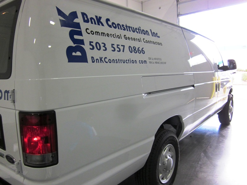 Vehicle Graphics for Entire Fleet of Trucks &amp; Vans for BnK Construction in Gladstone, OR Keep Their Brand Consistent