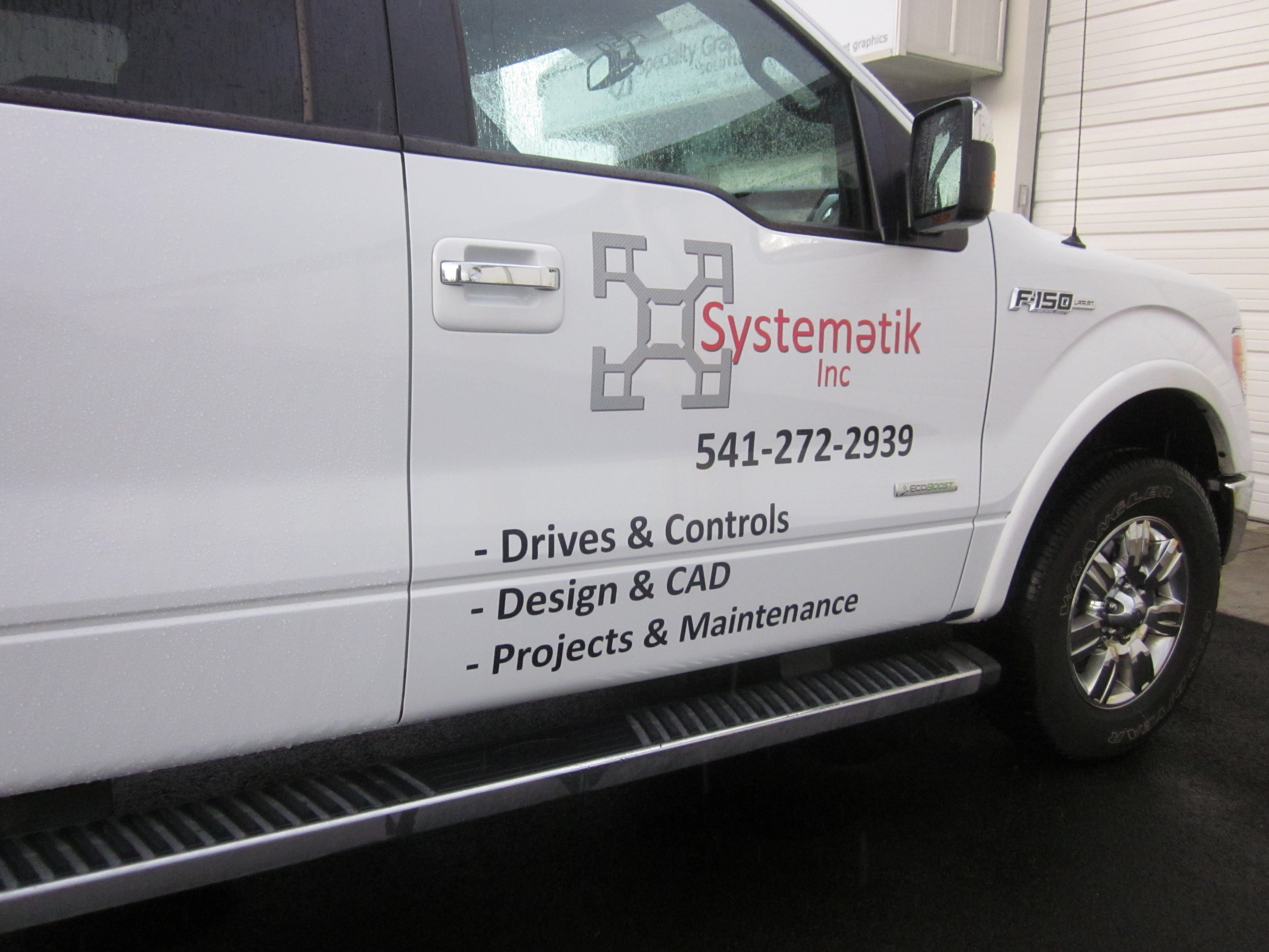 Vehicle Wrap Graphics for a Work Truck &amp; Matching Hard Hat Decals Build Brand Identity - Systemetik (Newport, OR &amp; Vancouver, WA)