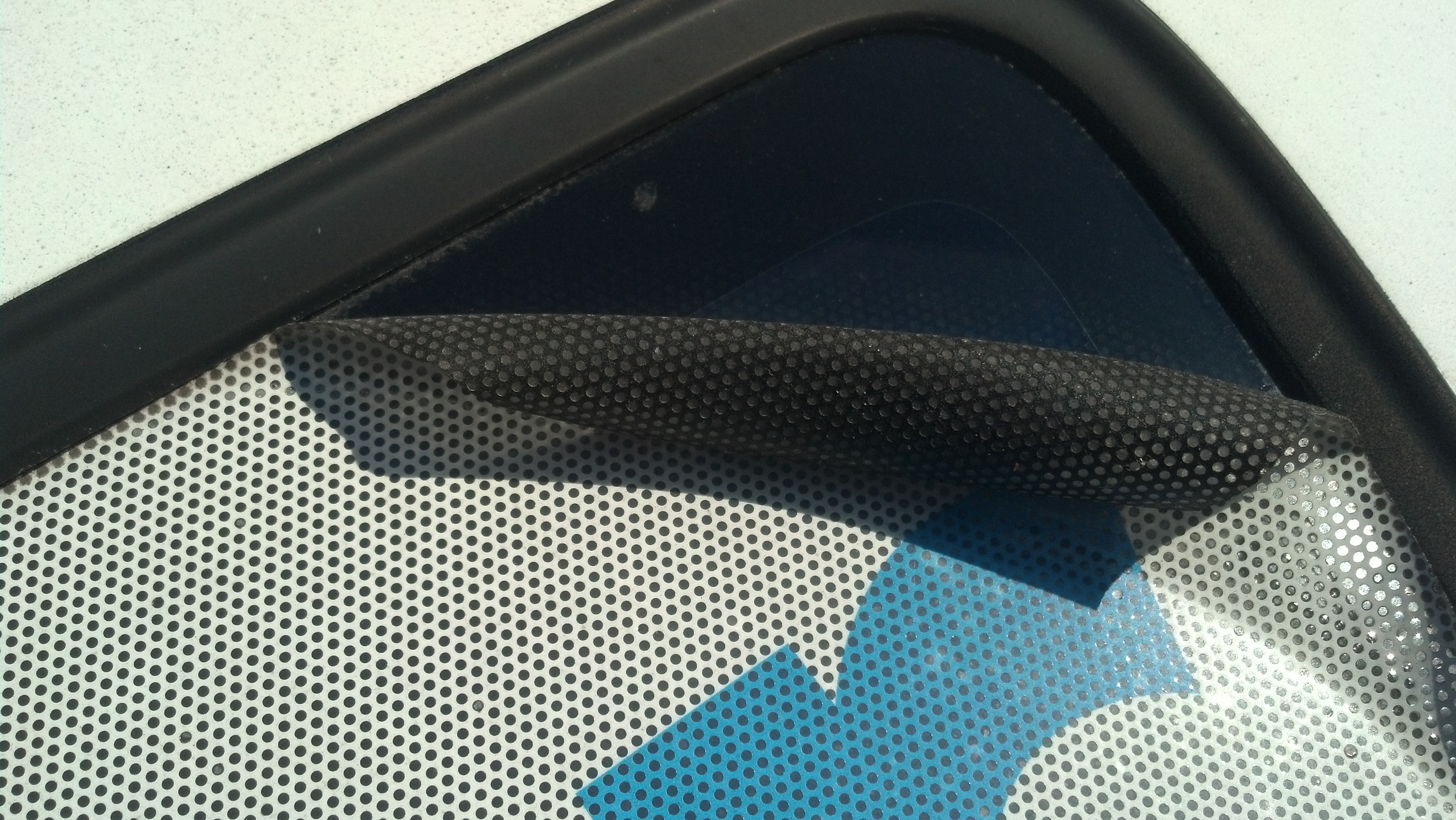 Why your window perforated vinyl graphics my be rolling off