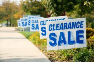 Sale announcement made by using yard signs