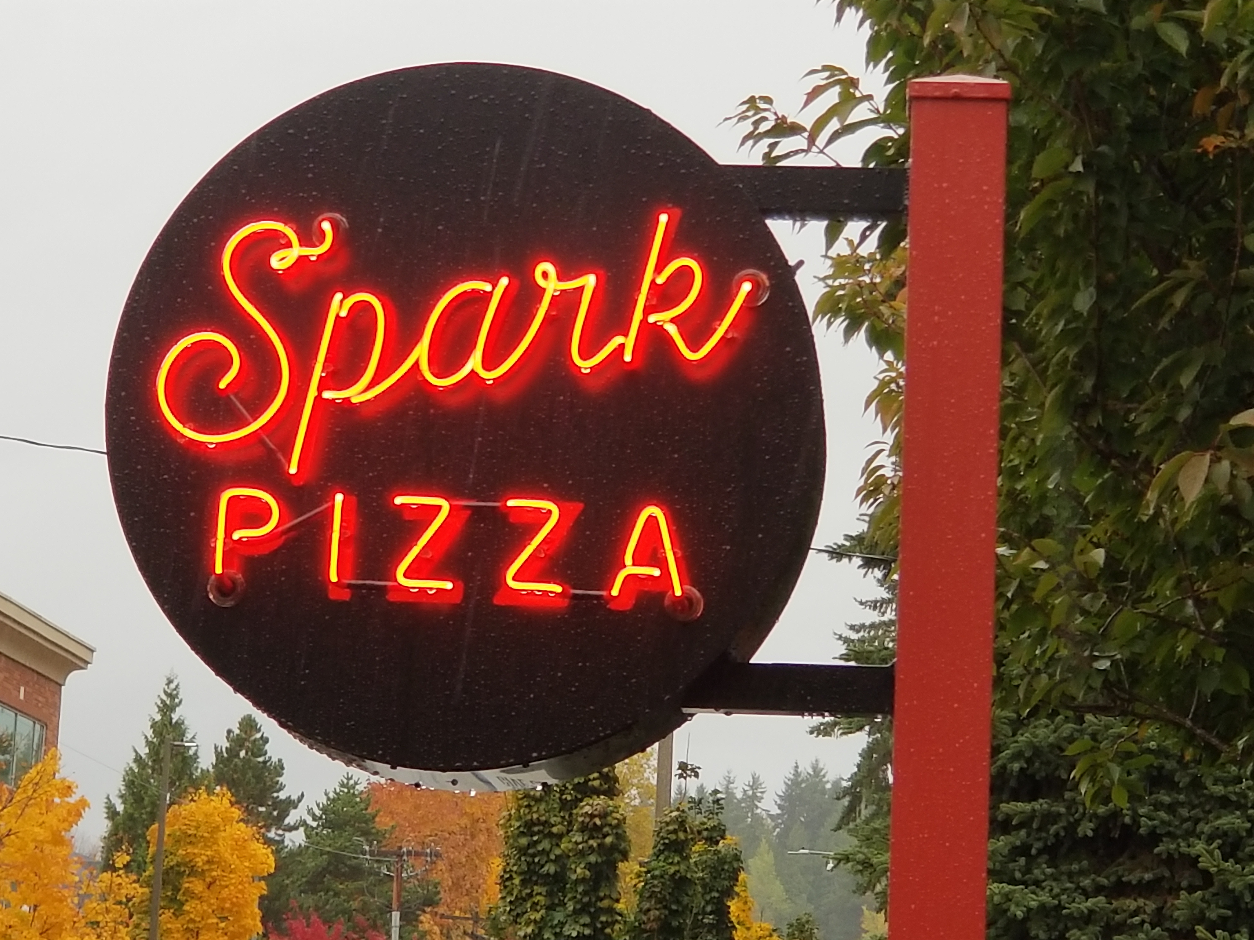 Neon lit free standing sign